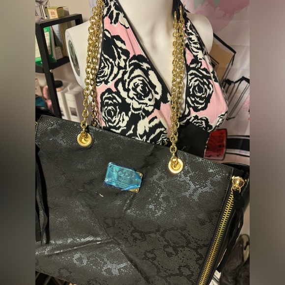 Like new Bebe black snack print tote/ shoulder bag with gold chain straps - Picture 12 of 14